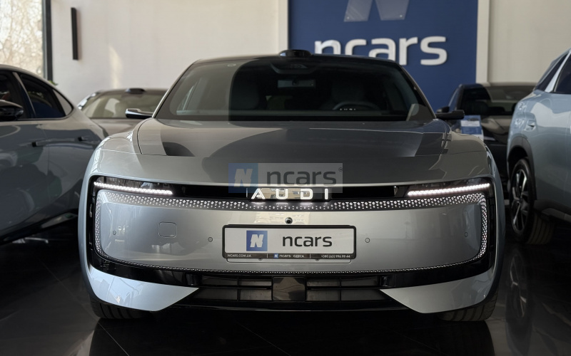 Audi E5 Sportback фото збоку